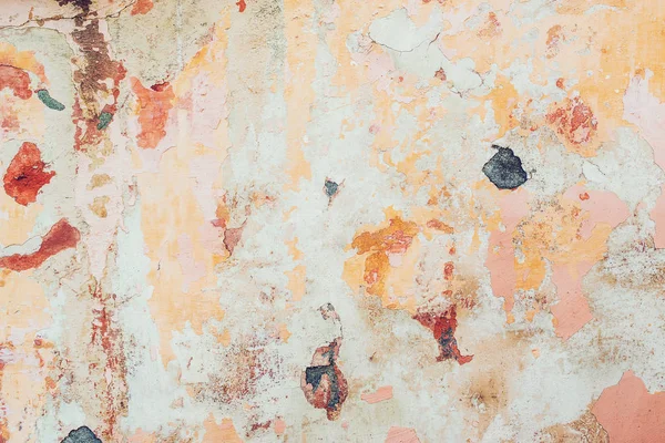 Vecchio muro incrinato colorato, sfondo, consistenza — Foto Stock