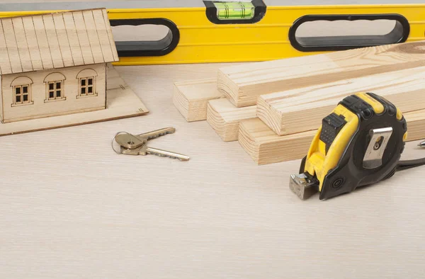 Construction concept, model house, tools, keys.Copy space for text. — Stock Photo, Image