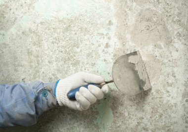 İnşaat ve tadilat kavramı. El araçlar sıvama ile alt.