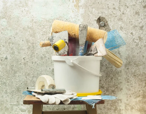 Plastic bucket with construction tools. Renovation concept. — Stock Photo, Image