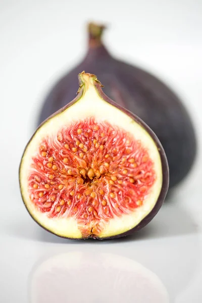 Half sliced fig studio shot — Stock Photo, Image