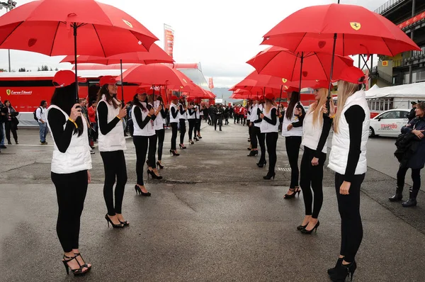 MUGELLO, IT, November, 2011: Unidentified Pit Babe poses for photos in the paddock during Finali Mondiali Ferrari 2011 at the Mugello Circuit in Italy — Stock Photo, Image