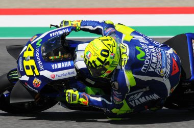 MUGELLO - ITALY, MAY 21: Italian Yamaha rider Valentino Rossi at 2016 TIM MotoGP of Italy on May 21, 2016 clipart