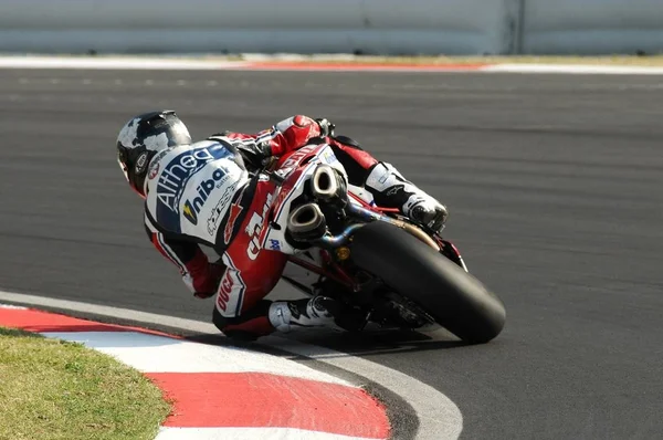 San Marino, Italy - Sep 24, 2011: Ducati 1198R of Althea Racing, driven by Carlos Checa in action during the Superbike Practice in Imola Circuit, Italy — Stock Photo, Image