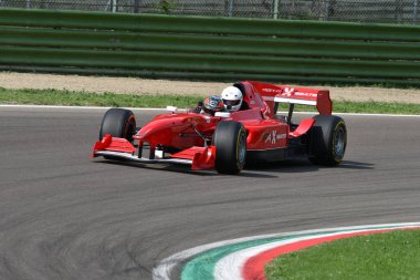 Imola, 6 May 2018: Unknowns run with FA1x2 seater A1GP Formula Car during Minardi Historic Day 2018 in Imola Circuit in Italy. clipart