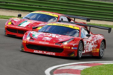 Imola, Italy May 17, 2013: Ferrari F458 Italia GT3 of Team AF Corse, driven by A. RIZZOLI / S. GAI / L. CASE' in action during the European Le Mans Series - 3 Hours - Imola, Italy clipart