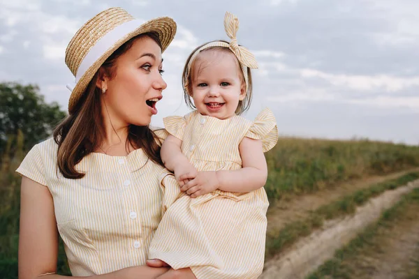 Family Mom Daughter Walking Hill Field Yellow Identical Dresses — Stock Photo, Image