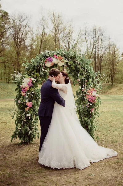 Wedding Spring Groom Kisses Embraces Bride White Dress — Stock Photo, Image