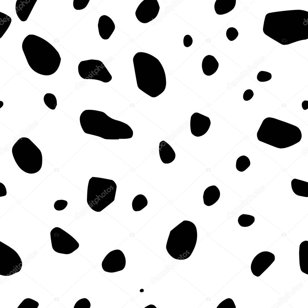 Black and white spots on white background