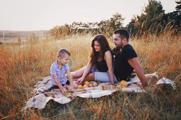 Young family with a child have fun outdoors — Stock Photo, Image