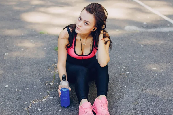 Sports girl in park — Stock Photo, Image