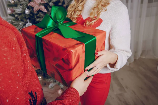 Loving couple decorating Christmas tree — Stock Photo, Image