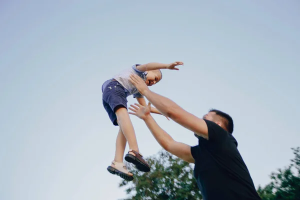 Young family with a child have fun outdoors — Stock Photo, Image