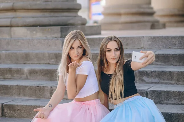 Girls in skirt — Stock Photo, Image