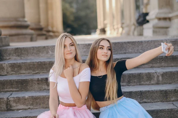 Girls in skirt — Stock Photo, Image