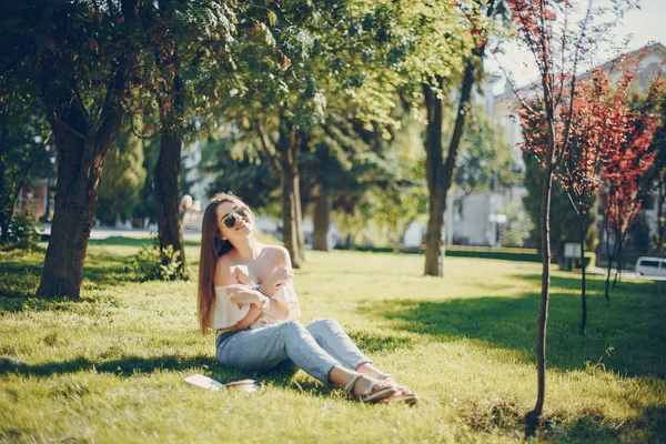 Girl in a park — Stock Photo, Image