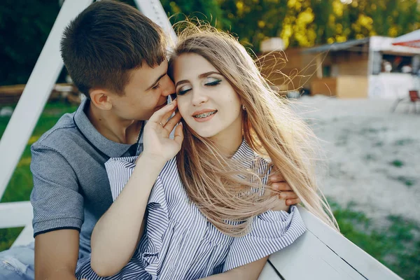 Couple on a swing — Stock Photo, Image