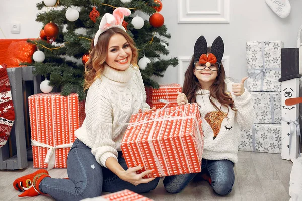 Mother with cute daughter in a christmas decorations — Stock Photo, Image