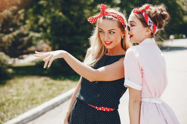 Retro girls in a park