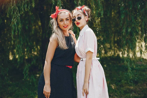 Retro girls in a park