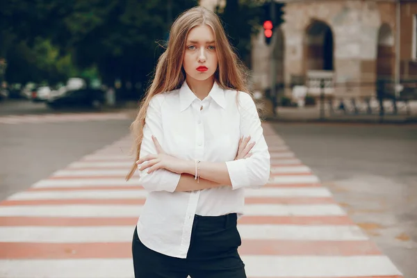 Stylish gir standing in a summer city — 스톡 사진