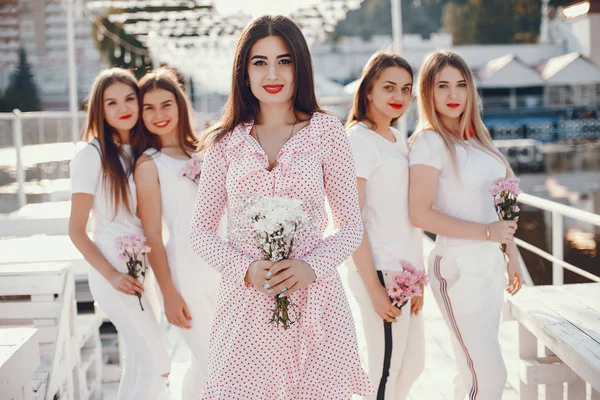 Pretty girls in a summer park on a hen party