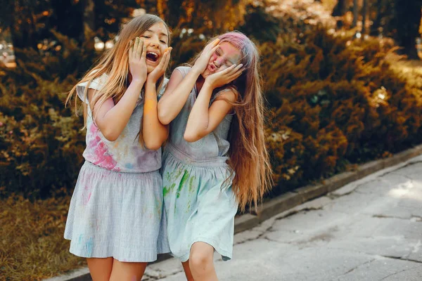 Two cute girls have fun in a summer park — Stock Photo, Image