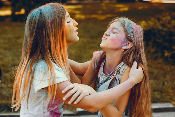 Two cute girls have fun in a summer park — Stock Photo, Image