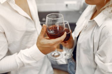 Beautiful couple spend time at home in a kitchen