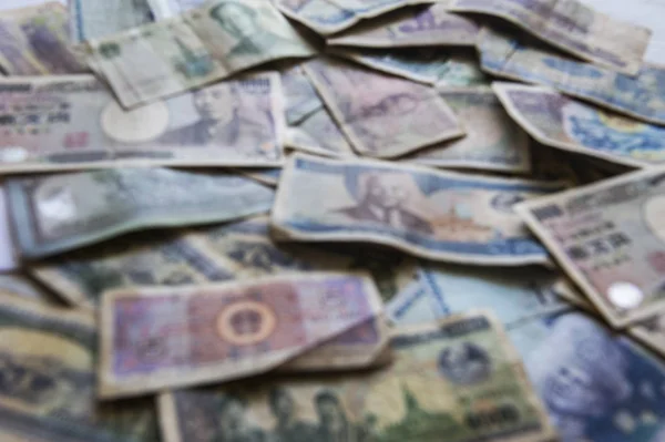 Internationale valuta, Aziatische bankbiljet. Wazig ambtshalve focus stijl — Stockfoto