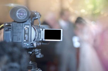 çekim gelin ve Damat Düğün töreni, odak fotoğraf makinesi, video kamera ile.