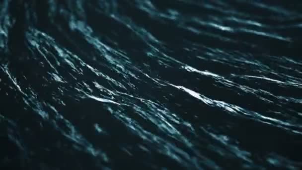 Κοντινό πλάνο της βαθιάς μπλε επιφάνειας του νερού με μικρούς κυματισμούς. — Αρχείο Βίντεο