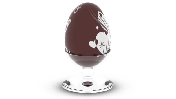 Videókat. 3D illusztráció. Csokoládé húsvéti tojás kerék bemutató különböző dekorációk.