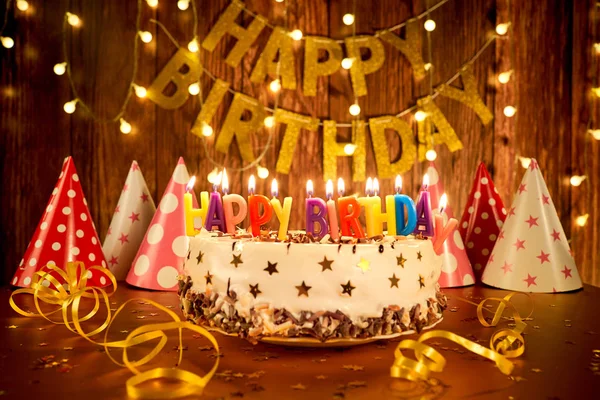 Happy birthday cake with candles Stock Photo by ©lacheev 179993854