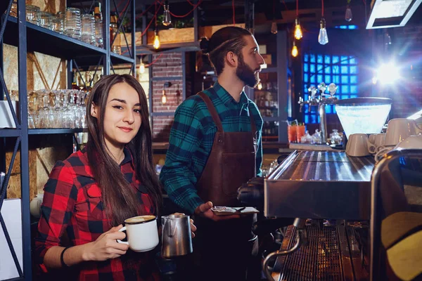 Girl barista bartender waiter in uniform making coffee at the ba — Stock Photo, Image