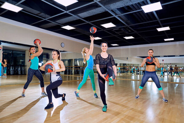 Group of women in training in the gym