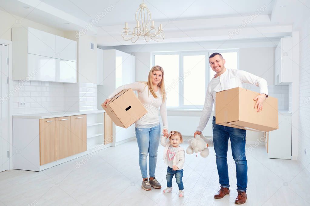 A happy family moves to a new apartment. 