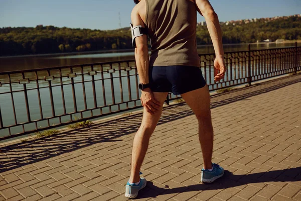 Injury, stretching, bruise on a run in a runner — Stock Image Injury, stretching, bruise on a run in a runner Stock Image