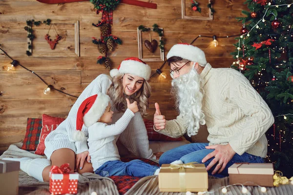 Happy family playing in the room at Christmas — Stock Photo, Image