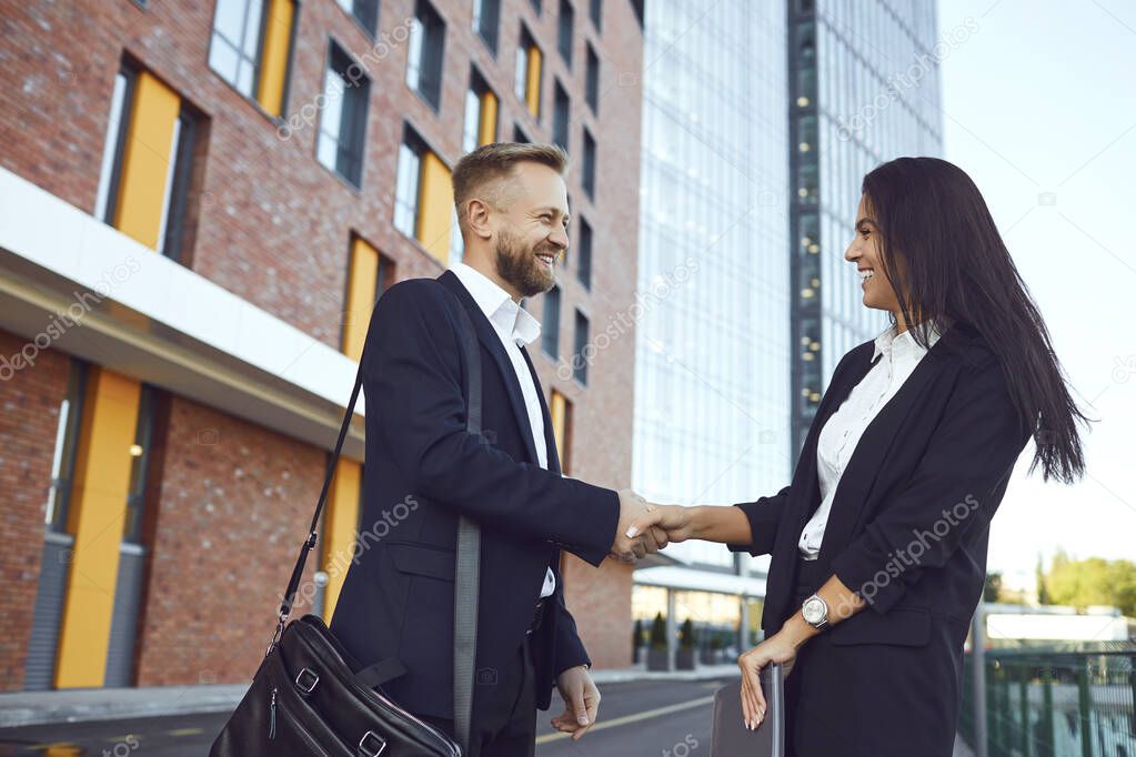 Handshake business. Businessman and business woman make handshakes