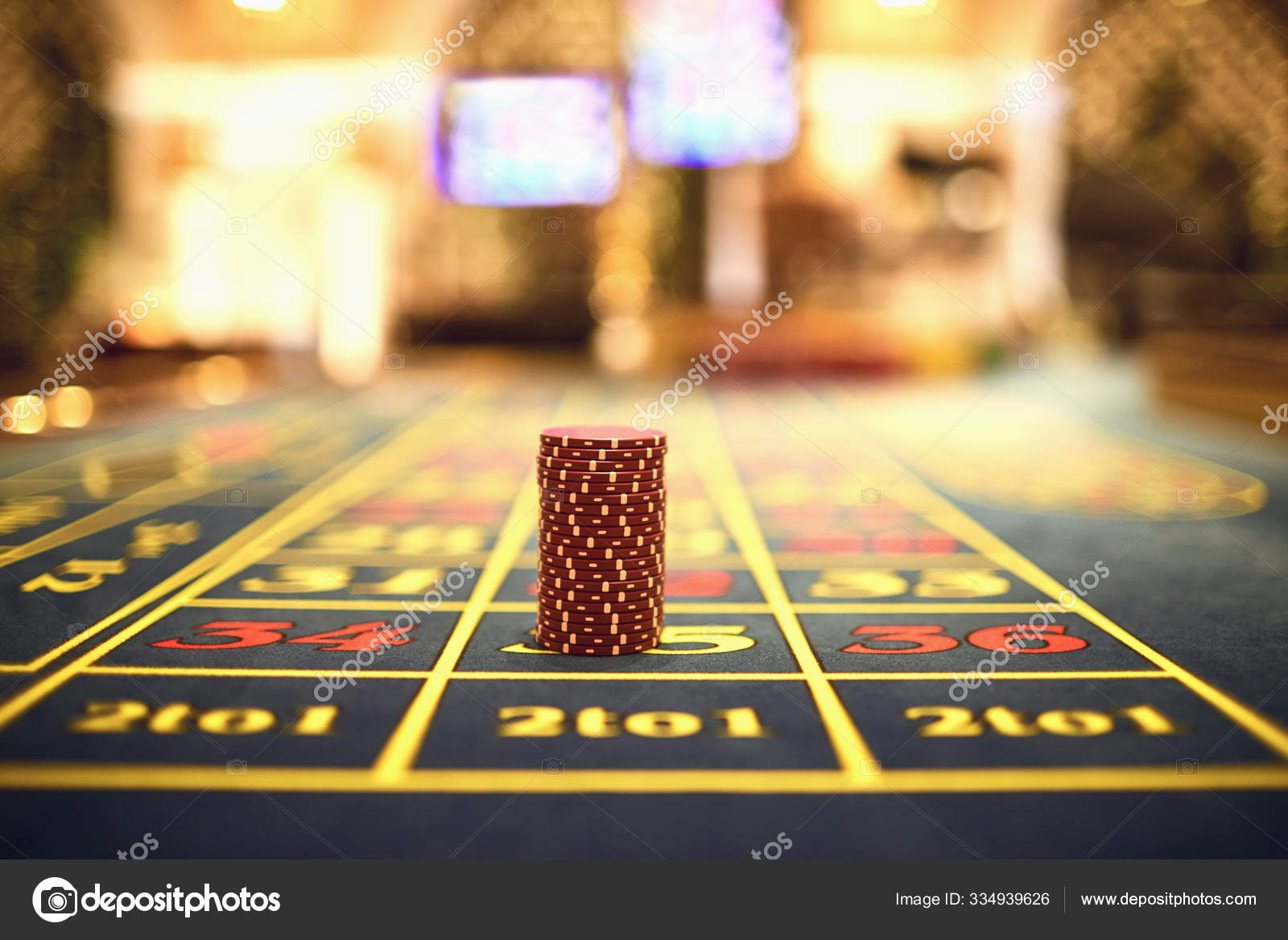 Roulette chips on a gaming table in a casino. — Stock Photo © lacheev