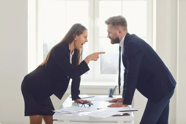 Business conflict. Competition conflict dispute business angry people at a table in an office — Stock Photo, Image