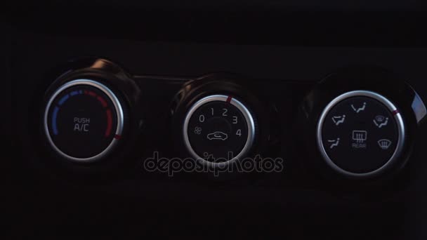Close up shot of the hand, which turn on the air guide system in the car. — Stock Video