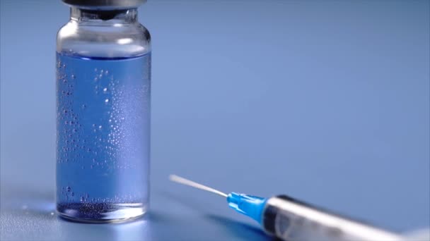 Close up view of ampoule and syringe with selective focus. — Stock Video