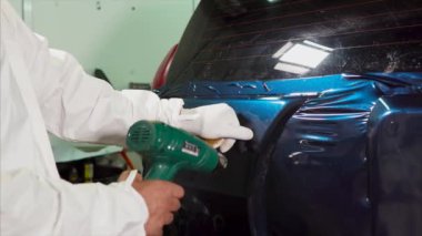 Garaj pürüzsüz yüzey makine, yapıştırılan vinil uzman.