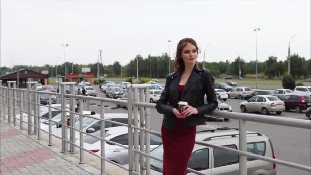 Pretty girl having coffee break outside — Stock Video