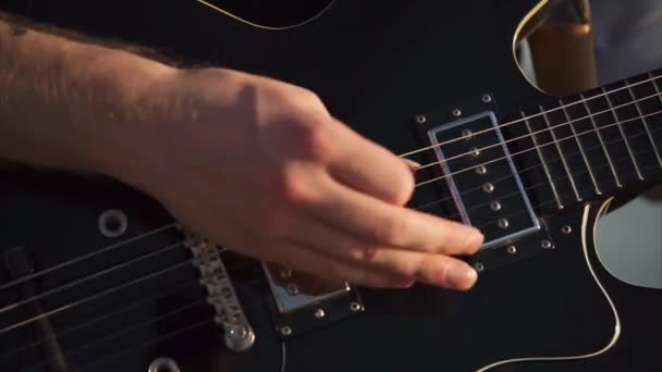 Fingerpicking on solo guitar — Stock Video