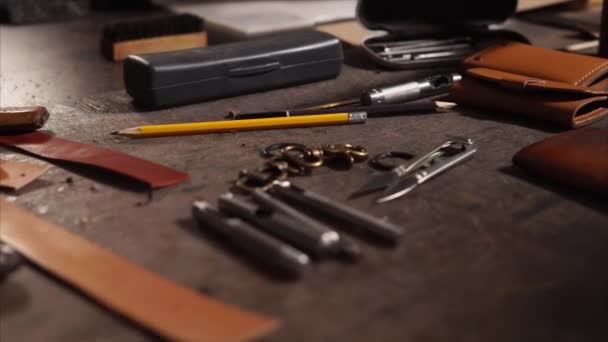 Work place of the leather craftsman — Stock Video