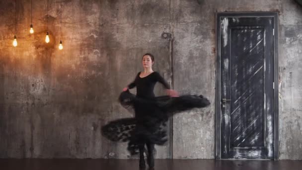 Passionate spanish woman is dancing tango alone in a dramatic room — Stock Video