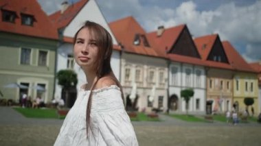 Lonely wistful girl in the town